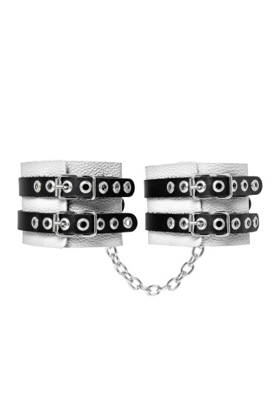 Бело-черные оковы с двумя ремешками и люверсами Бело-черные оковы с двумя ремешками и люверсами