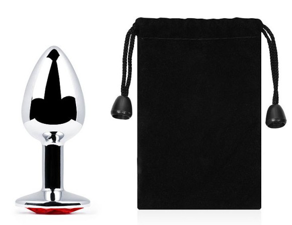 Серебристая анальная пробка с красным стразом - 7,2 см. Серебристая анальная пробка с красным стразом - 7,2 см.